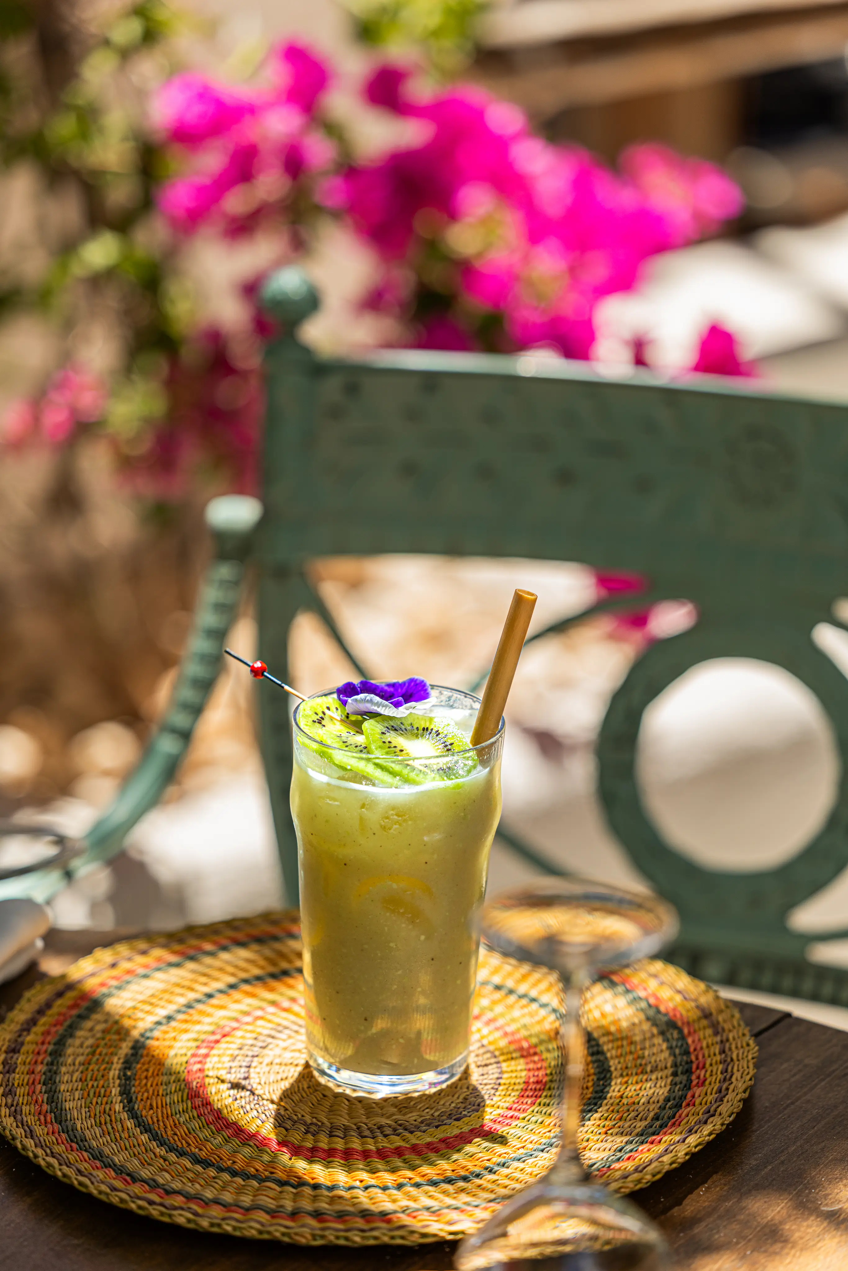Pouring traditional Moroccan mint tea with a beautiful lake view at Casa Lalla restaurant